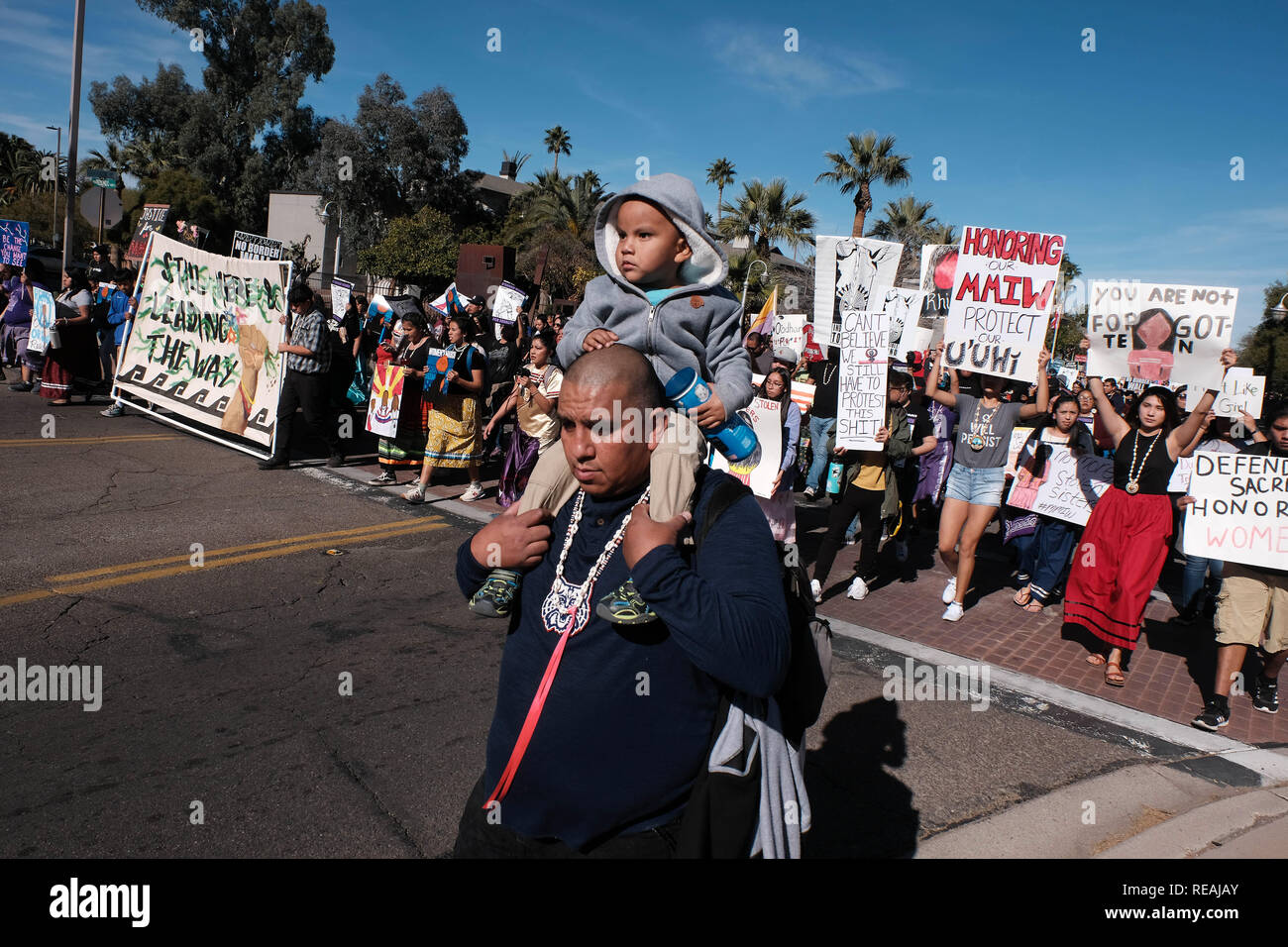 Tucson, Arizona, USA. 20th Jan, 2019. A crowd of 15,000 took part in the Woman's March in Tucson. Protesters rallied for woman's rights and against Trumps policies that are harmful to women. They were lead by members of the Tohono O'odham nation. Credit: Christopher Brown/ZUMA Wire/Alamy Live News Stock Photo