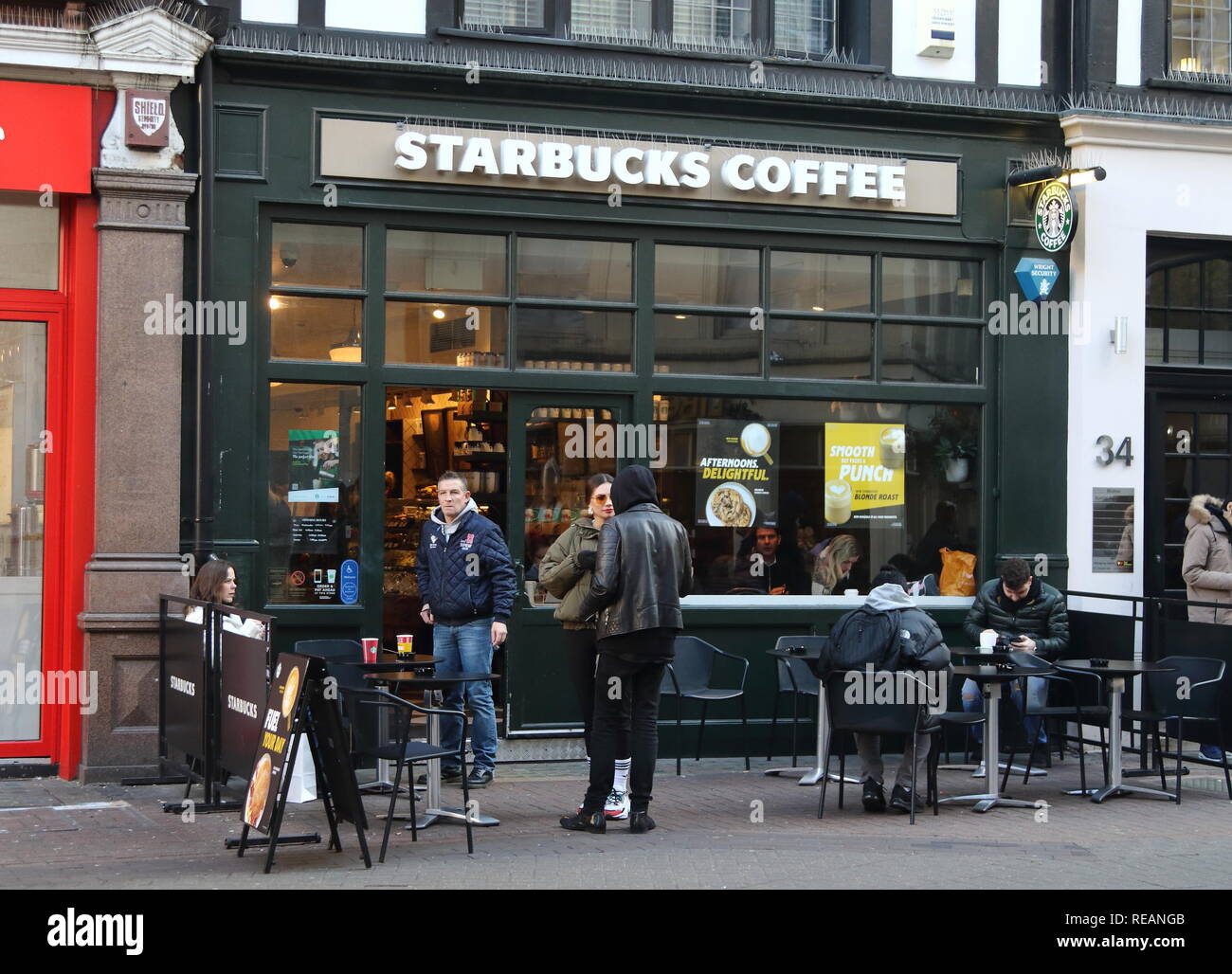 Starbucks Coffee brand logo seen in Carnaby Street in London, UK Stock