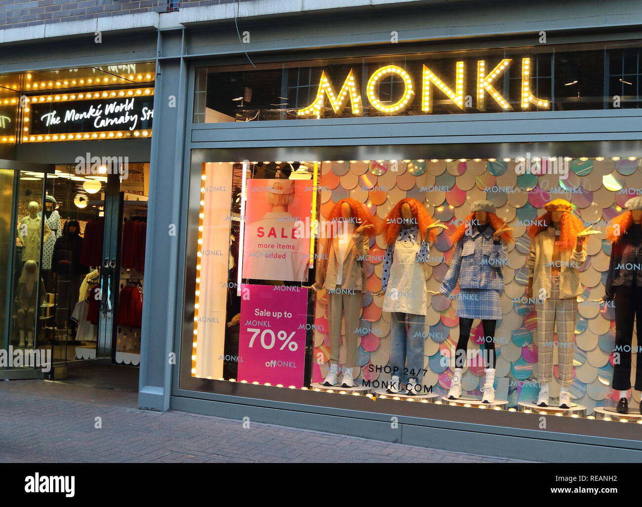 Monki brand logo seen in Carnaby Street in London, UK. Stock Photo