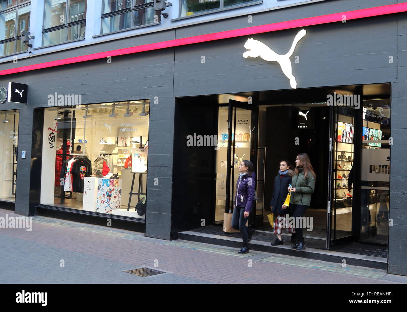 Puma brand logo seen in Carnaby Street in London, UK Stock Photo - Alamy