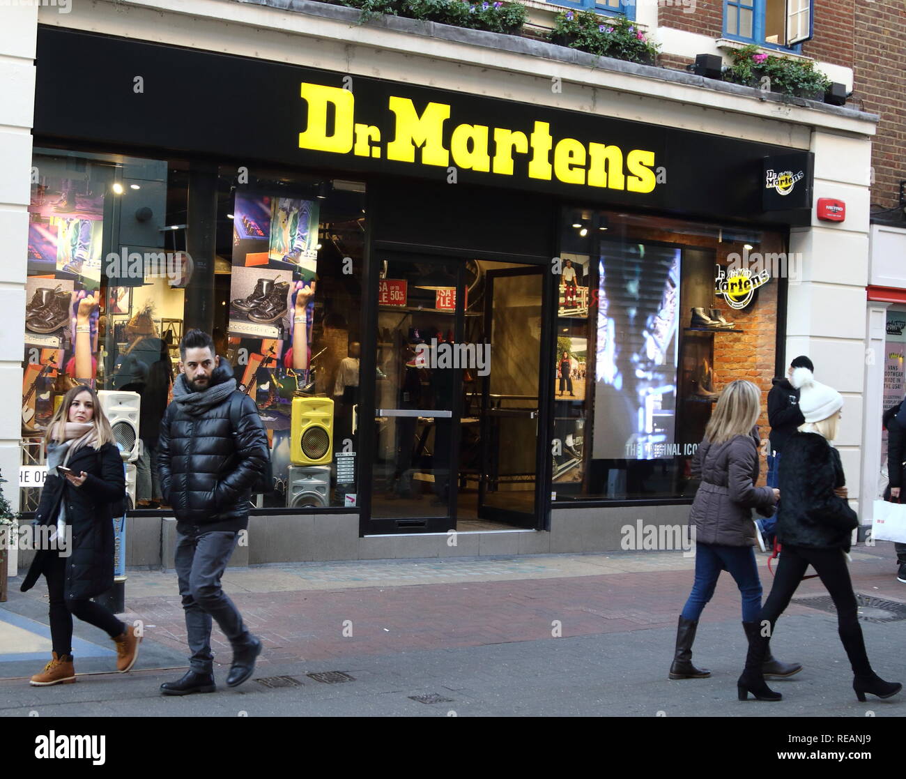 Dr Martens brand logo seen in Carnaby Street in London, UK Stock Photo -  Alamy