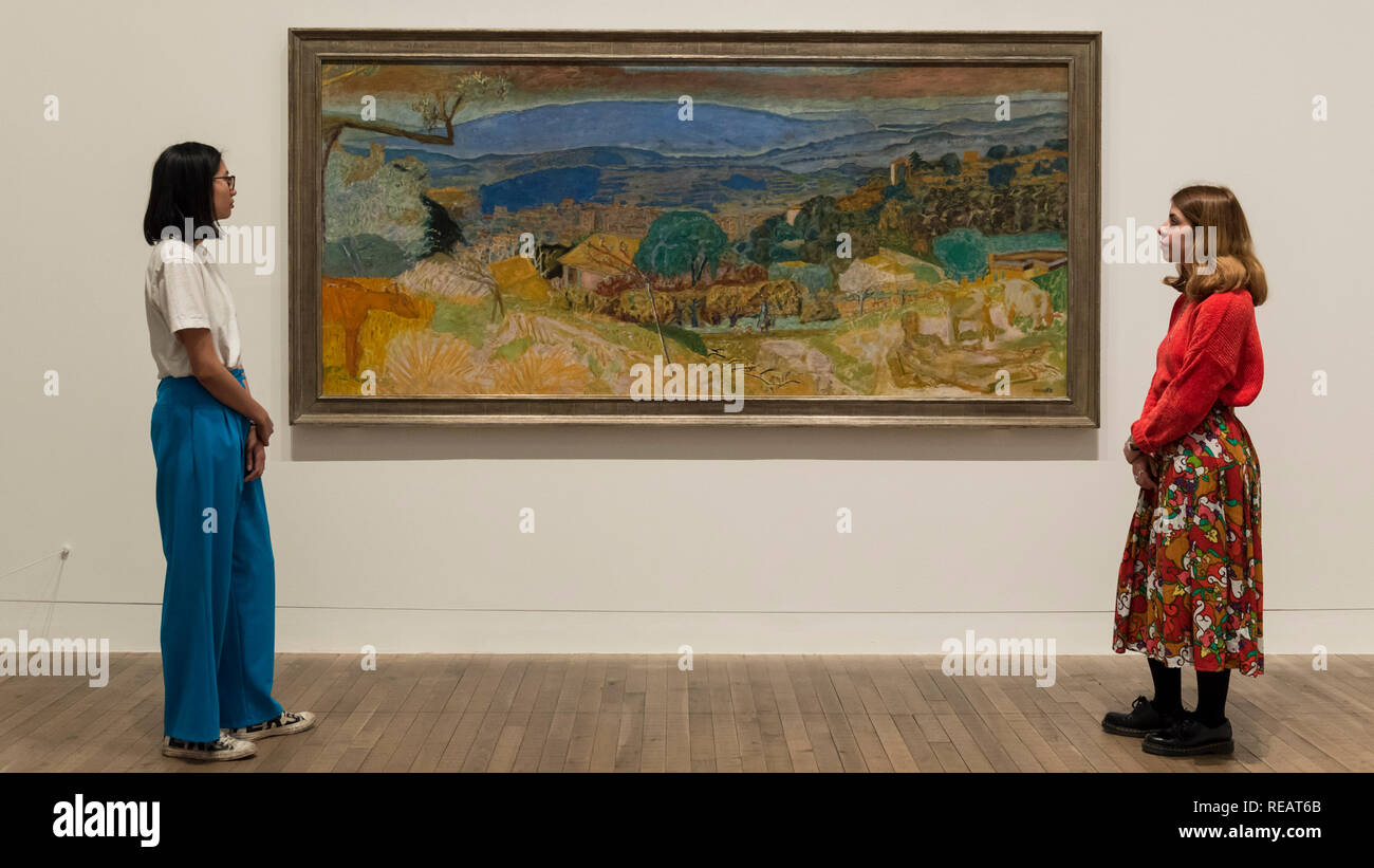 London, UK.  21 January 2019. Staff members view 'Landscape at Le Cannet', 1928, by Pierre Bonnard.  Preview of an exhibition called 'Pierre Bonnard: The Colour of Memory' at Tate Modern.  This is the UK's first major Pierre Bonnard exhibition in 20 years bringing together around 100 of his works from around the world covering a period from 1912 to his death in 1947.  The works are on show 23 January to 6 May 2019.  Credit: Stephen Chung / Alamy Live News Stock Photo
