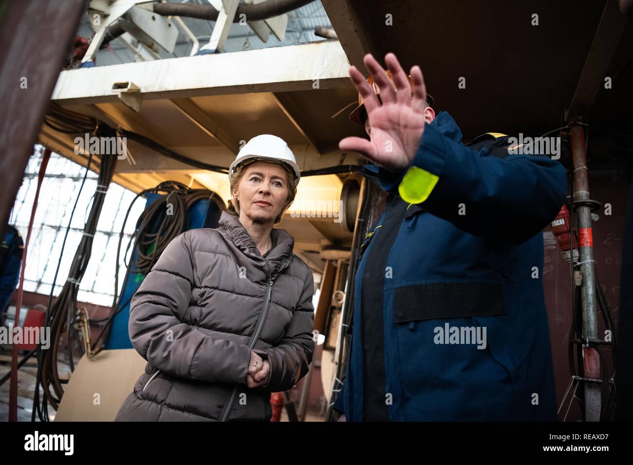 Bremerhaven, Germany. 21st Jan, 2019. Federal Defence Minister Ursula von der Leyen (CDU) is on board with Nils Brandt, commander of the Gorch Fock. During her visit, the Minister informed herself about the status of the repair work and spoke with crew members. Von der Leyen wants to decide within a few weeks on the future of the ailing sailing training ship. Credit: Mohssen Assanimoghaddam/dpa/Alamy Live News Stock Photo