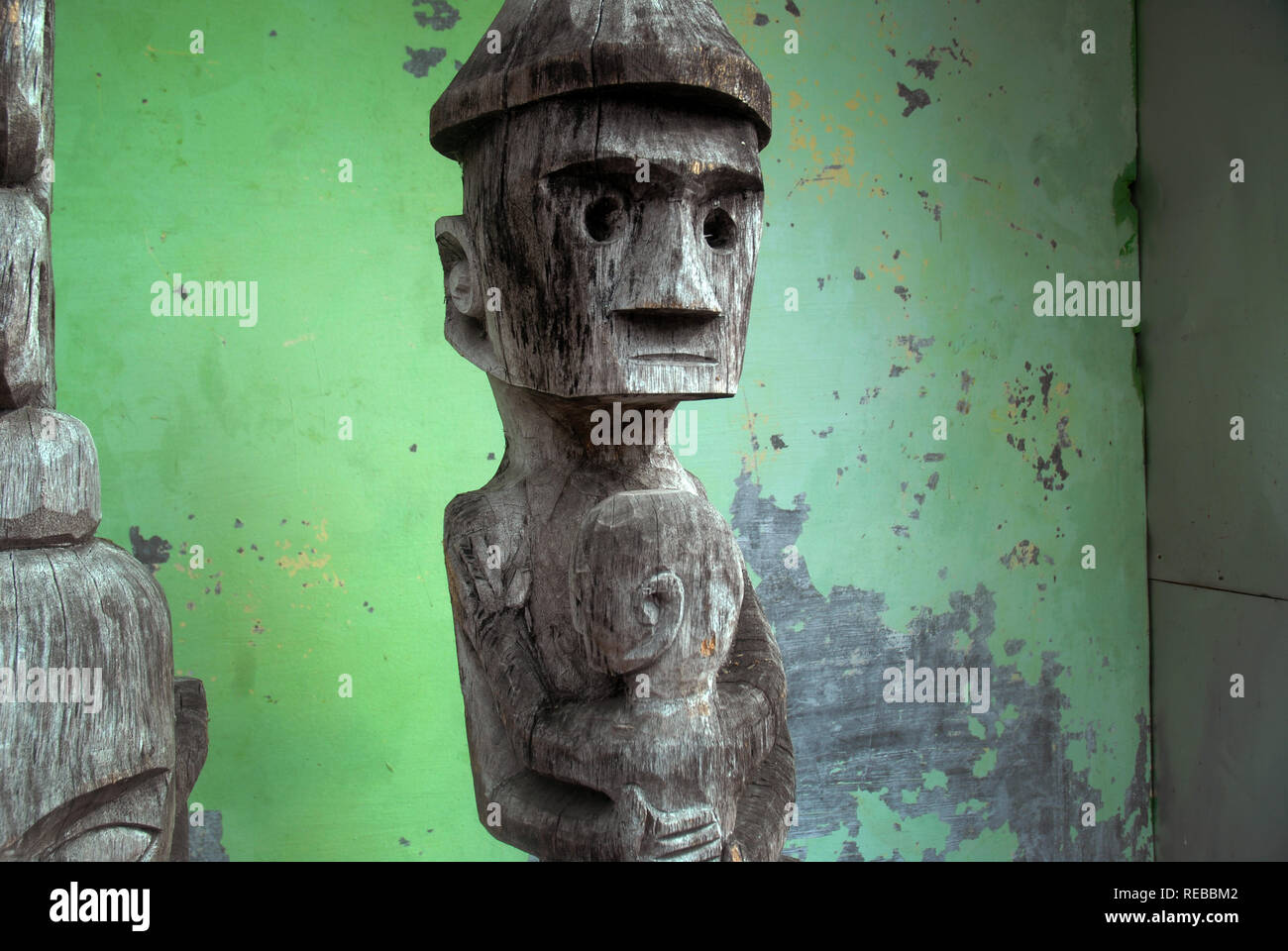 Head carved out of wood, Ubud, Bali, Indonesia. Stock Photo