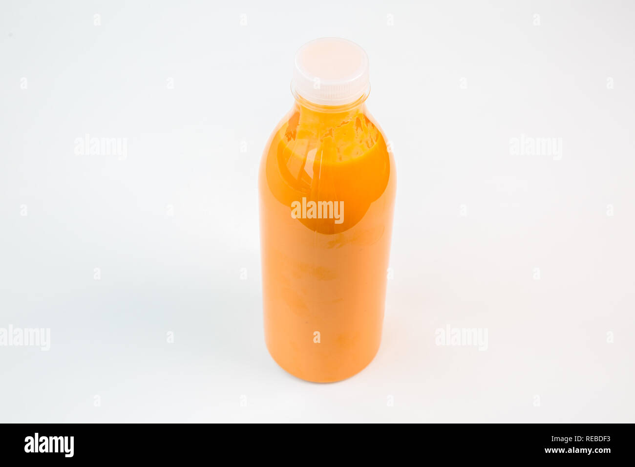 natural orange juice in a plastic bottle Stock Photo Alamy