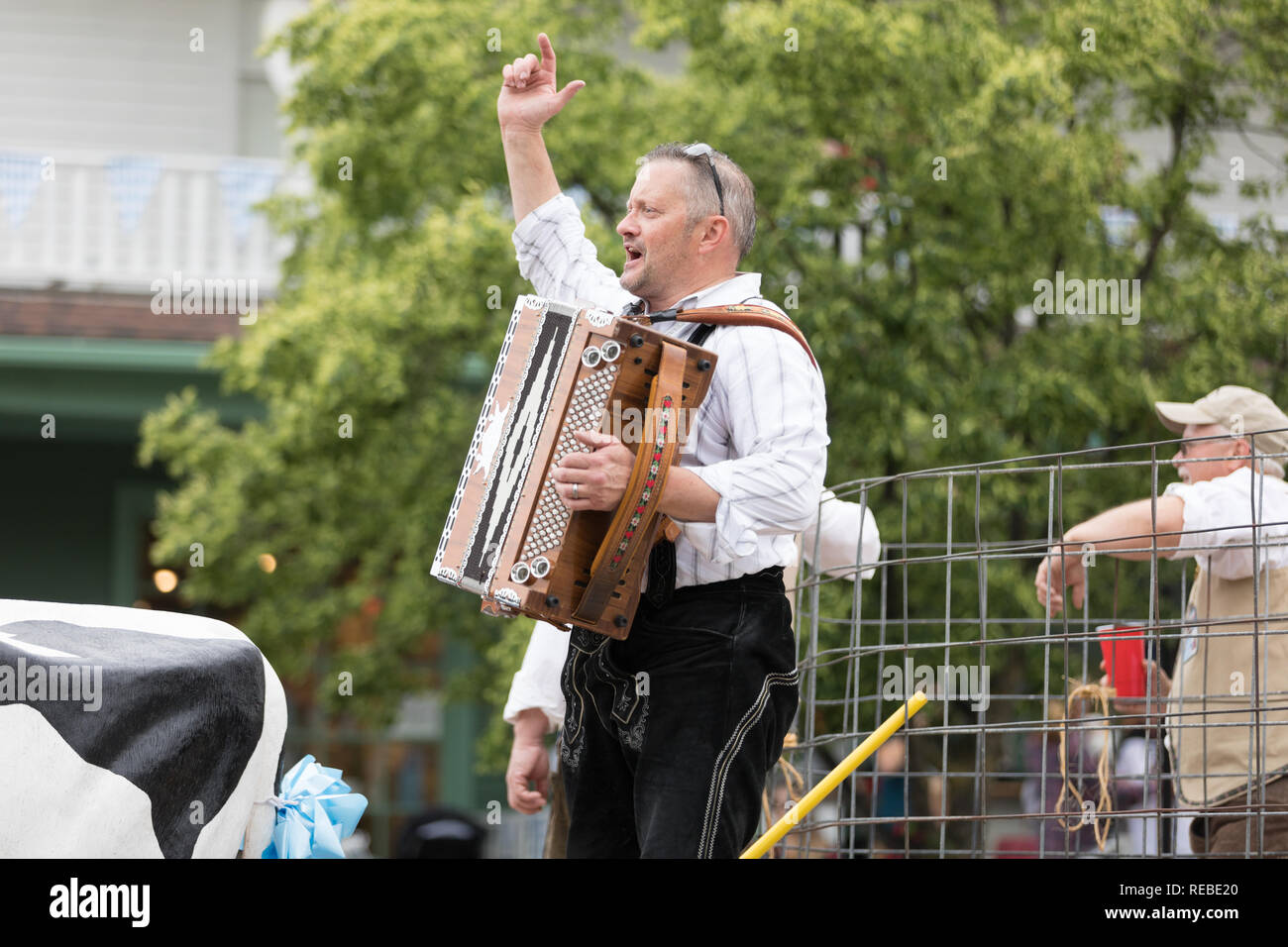 Frankenmuth, Michigan, USA June 10, 2018 The Bavarian Festival Parade, Mature men drinking