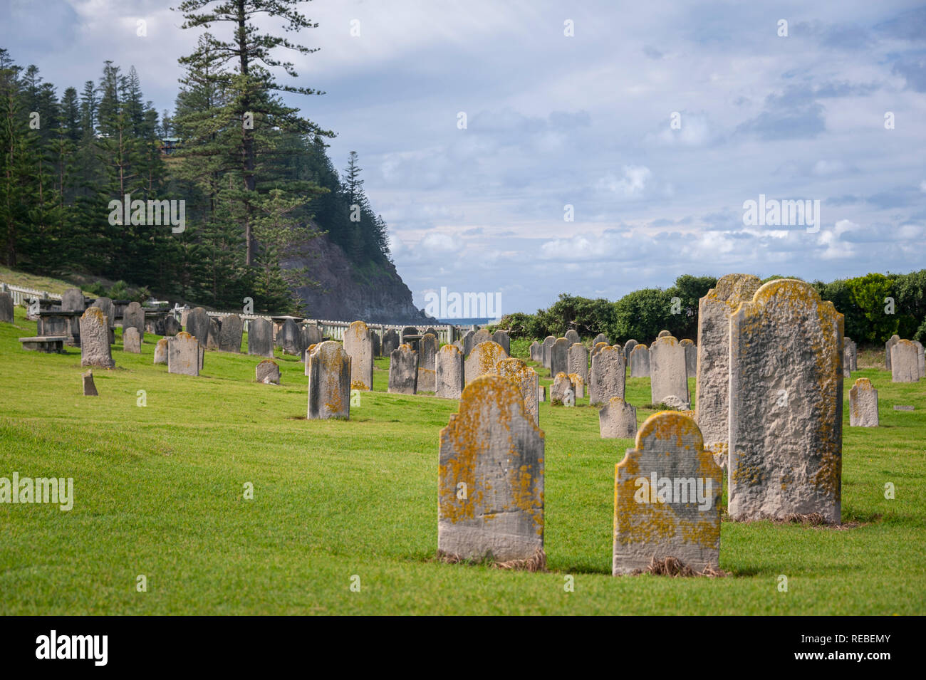 Ancient cemetery with old lichen encrusted head stones, Norfolk Island Australia Stock Photo
