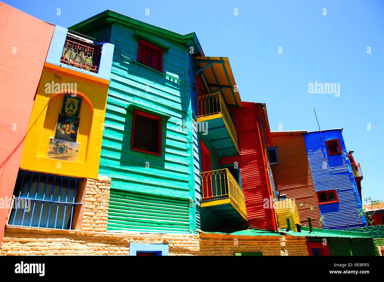 Colurful houses, corrogated iron facades, La Boca district, El Caminito, Buenos Aires, Argentina Stock Photo