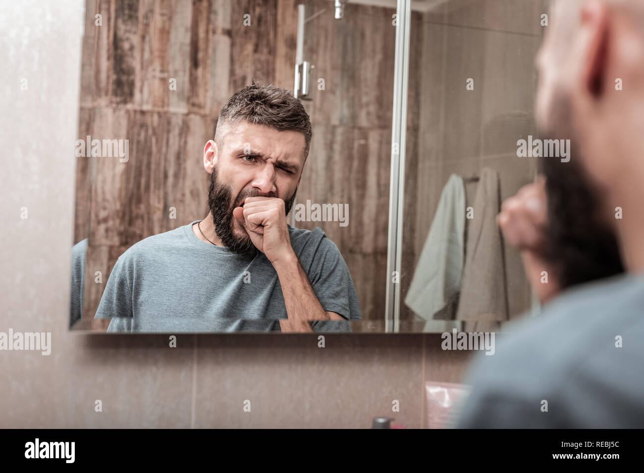 businessman-yawning-while-feeling-sleepy-in-the-morning-stock-photo-alamy