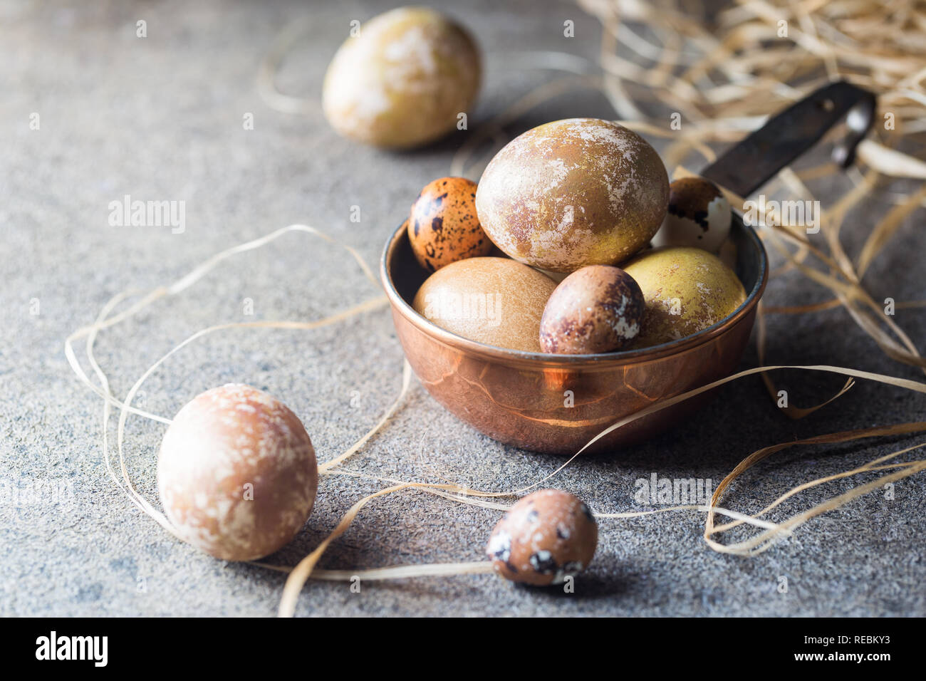 Easter background with painted Easter eggs in vintage style over dark background Stock Photo