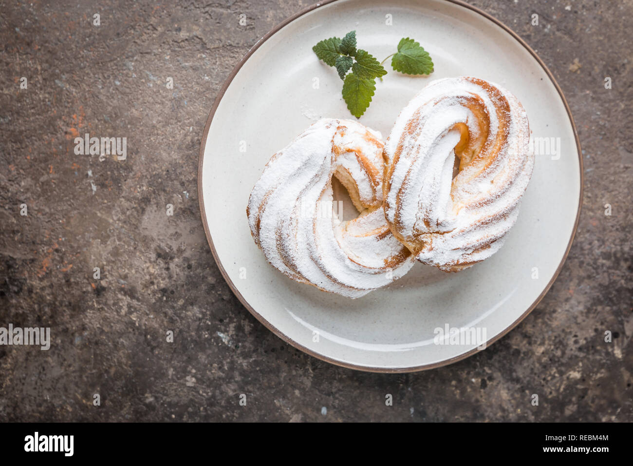 Custard Or Cottage Cheese Cakes Rings On A White Plate Top View