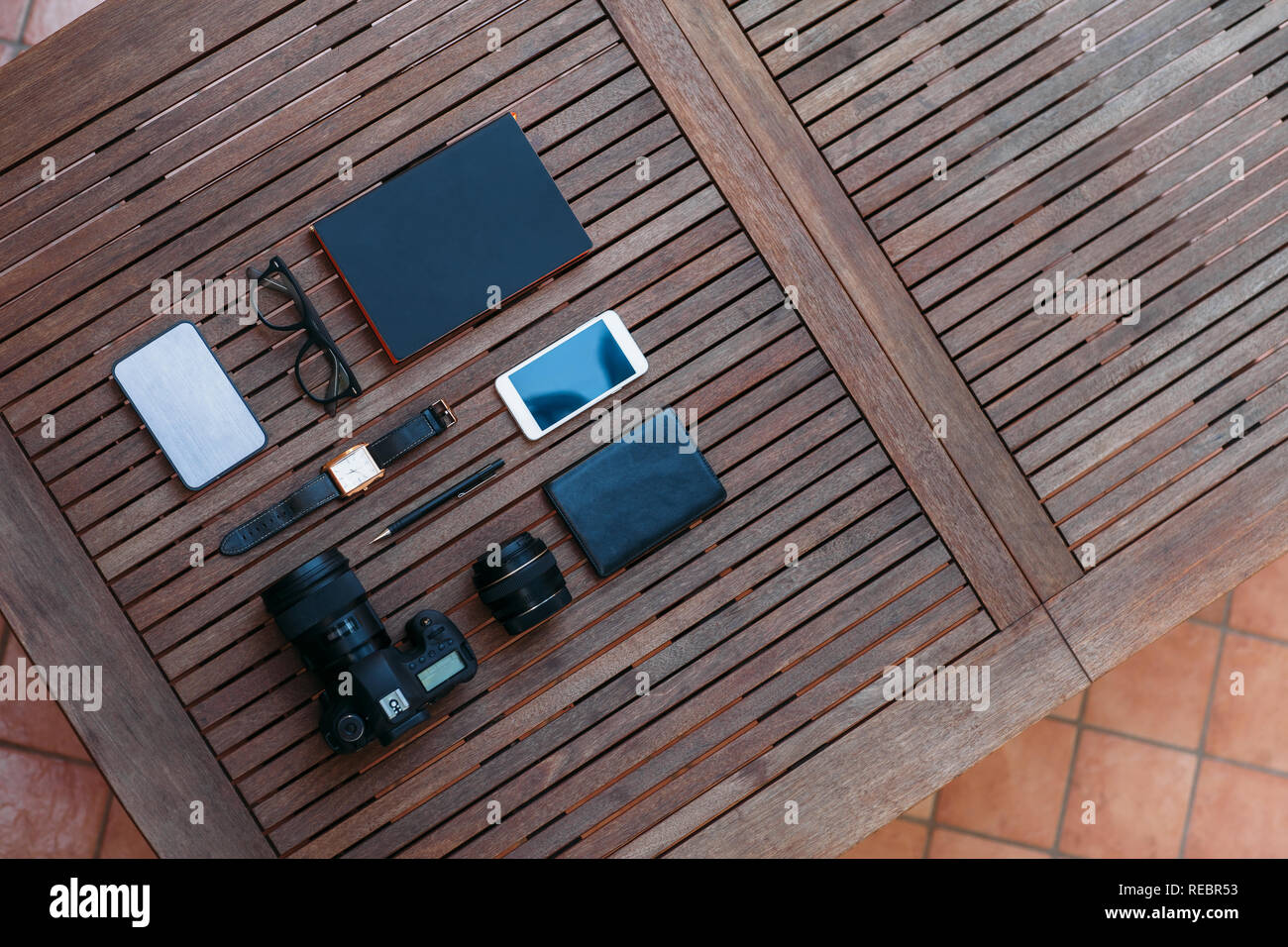 Man travel set and accessories on a wooden background. Top view Stock Photo
