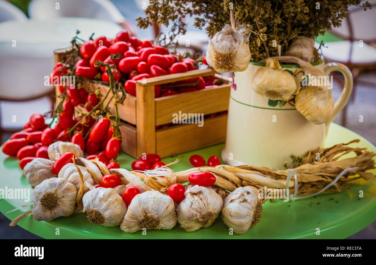 Garlic and tomatoes in Forio on the island of Ischia in Italy Stock Photo