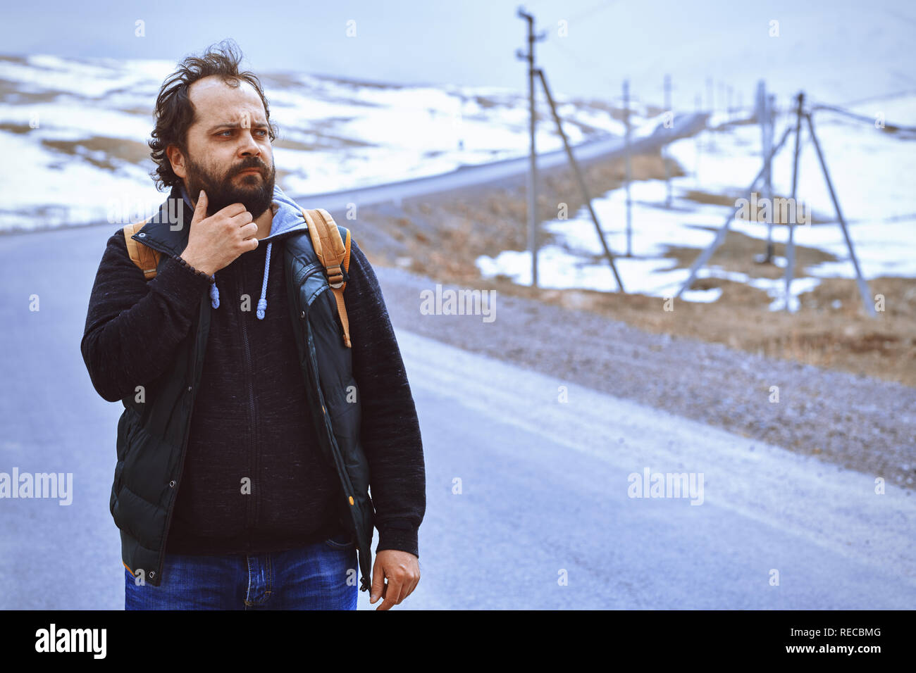 Man walking on winding road hi-res stock photography and images - Alamy