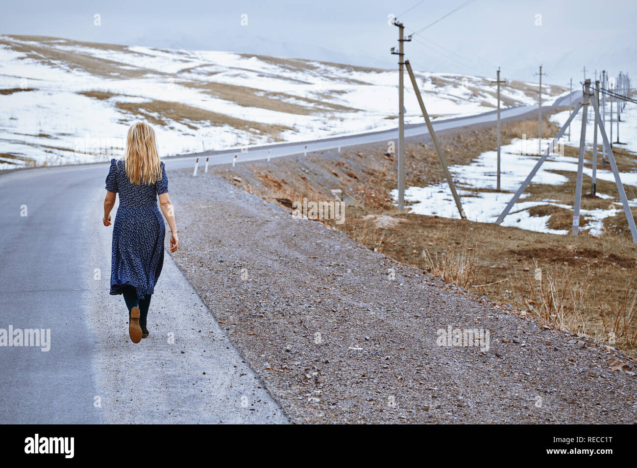 Woman walking along line hi-res stock photography and images - Alamy