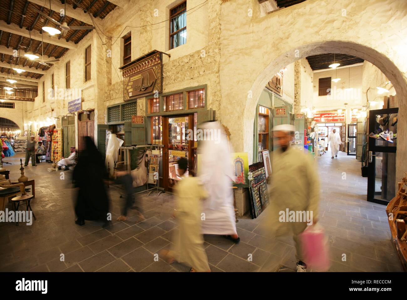 Men in a cafe in Souq al Waqif market, the oldest Souq or bazaar in the country, the old section has been recently renovated and Stock Photo
