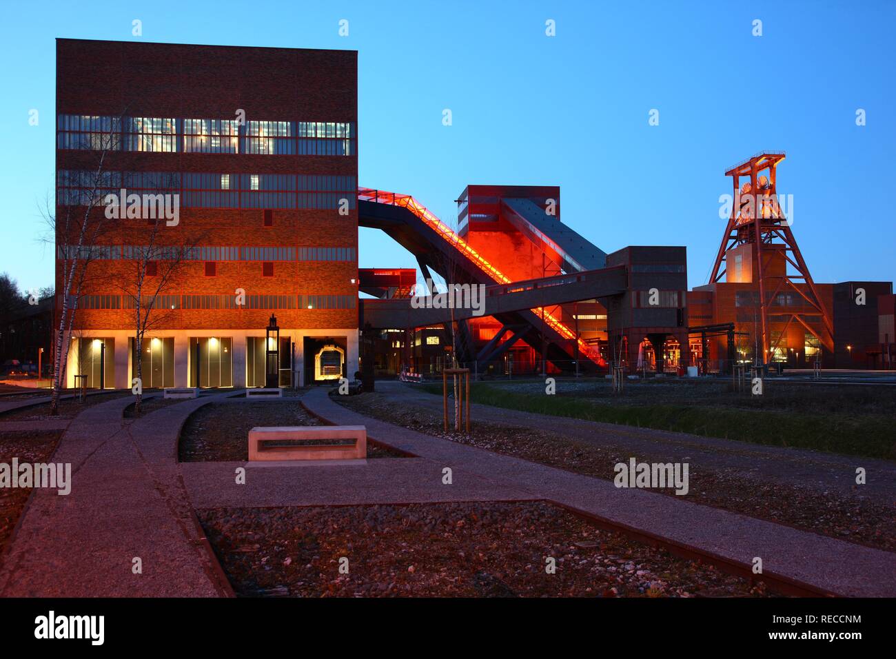 Red illuminated escalator, Exhibition halls in the former coal separation unit Kohlewaesche, former coal mine, Zeche Zollverein Stock Photo