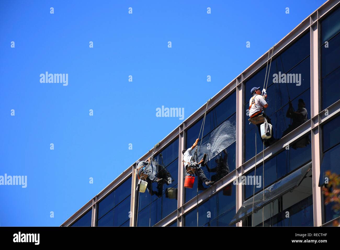Window cleaners on a skyscraper in Buenos Aires, Argentina, South America Stock Photo
