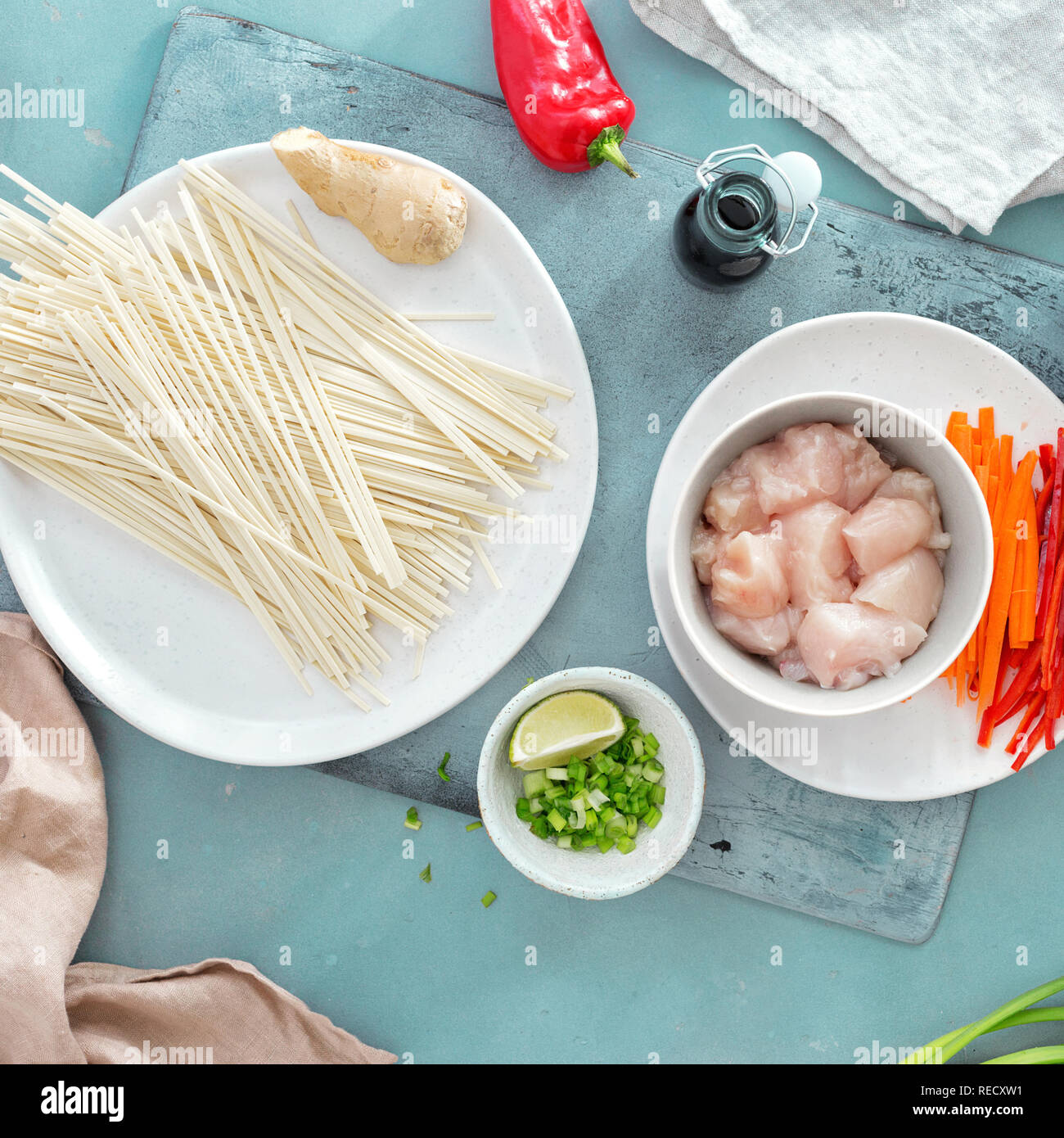 Raw ingredients cooking udon noodles with chicken meat top view Stock