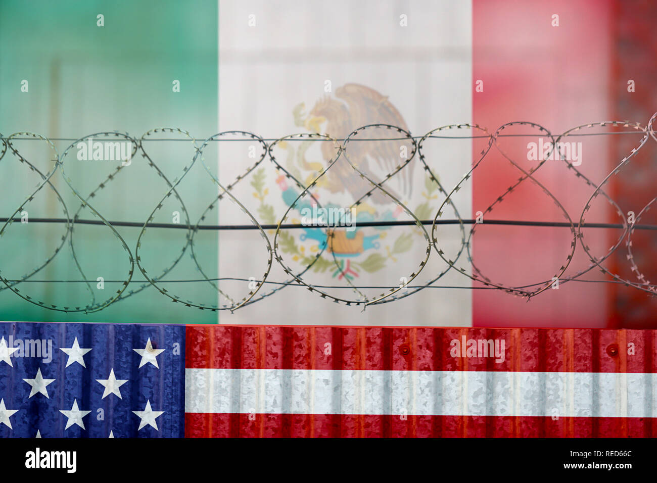 American flag and barbed wire, USA Mexico border wall Stock Photo Alamy