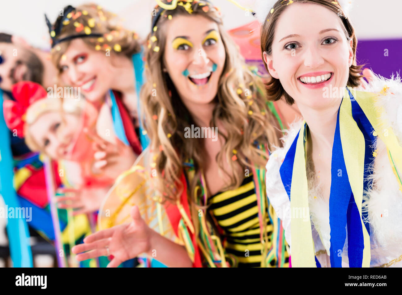 Party people celebrating carnival or new years eve Stock Photo