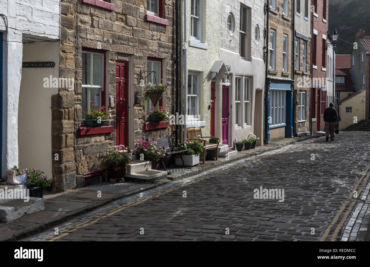 Hight Street leading down to the harbour side at Staithes in North Yorkshire Stock Photo