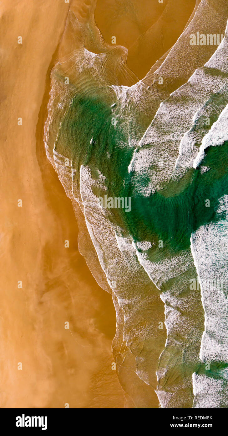 Beautiful aerial view of a beach with waves. Natural textures and