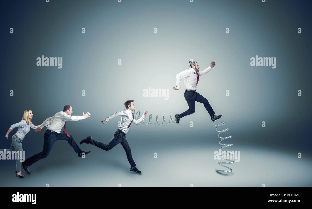 Business people run for leadership, one of them has a big advantage Stock Photo