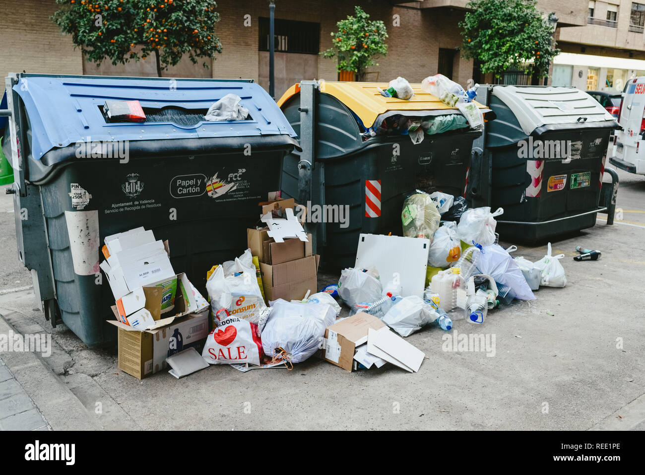 Valencia, spanish January 14, 2019 Street garbage containers full of