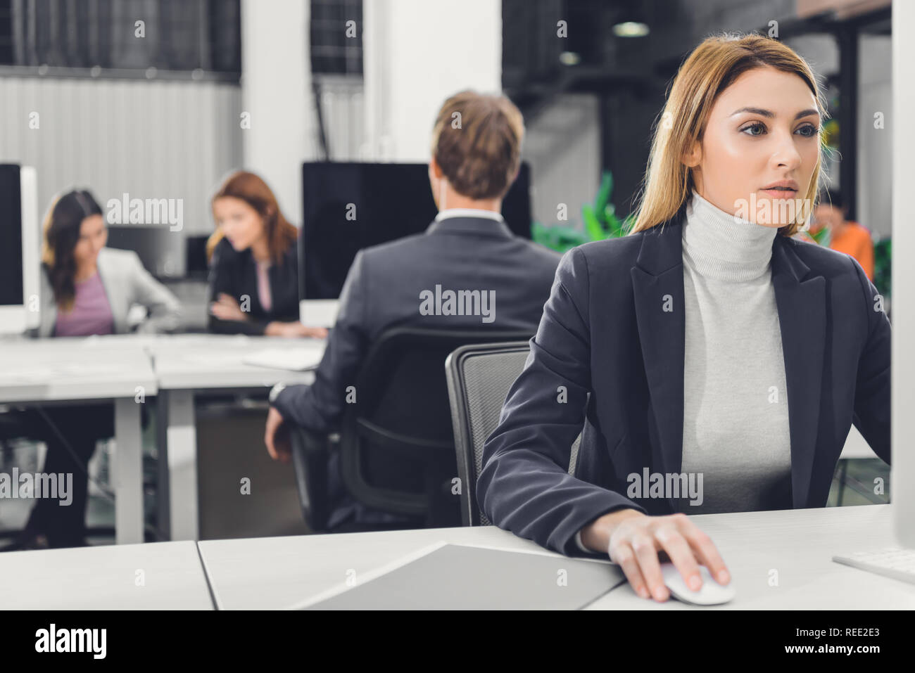 Group businesspeople using desktop hi-res stock photography and images ...