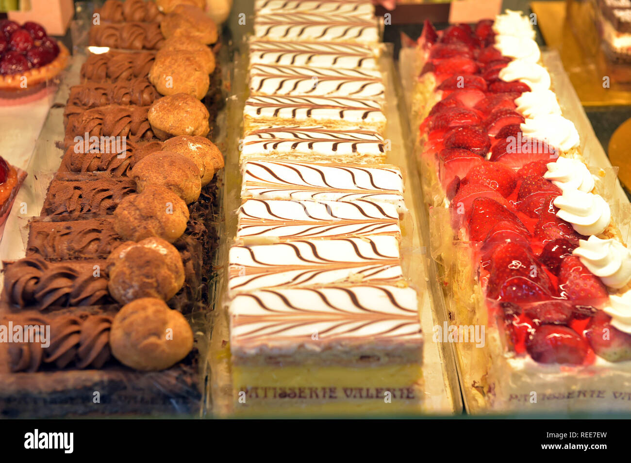 Patisserie Valerie cakes on display in a central London shop window