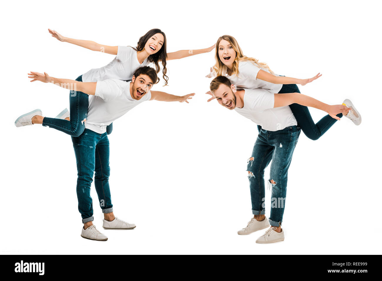 happy young couples piggybacking and smiling at camera isolated on white Stock Photo