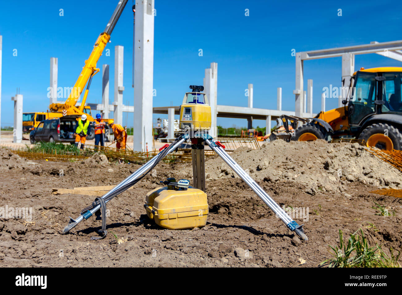 surveyor-instrument-for-measuring-level-on-construction-site-excavator