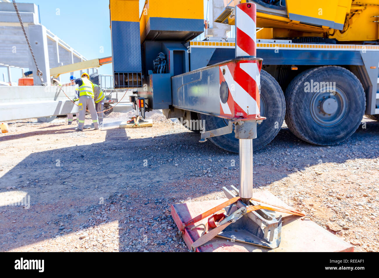 Extended side hydraulic outrigger to increase crane stability until is