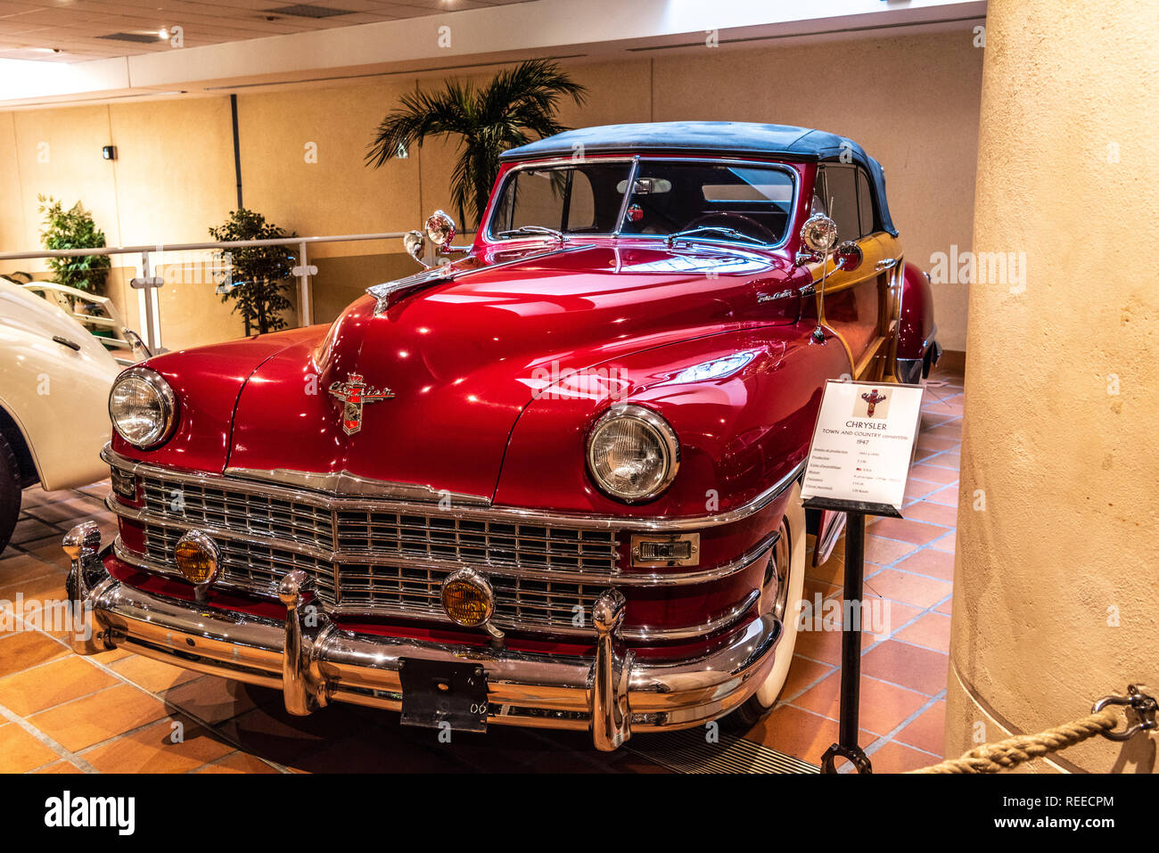 FONTVIEILLE, MONACO - JUN 2017: red CHRYSLER TOWN AND COUNTRY CONVERTIBLE 1947 in Monaco Top Cars Collection Museum. Stock Photo