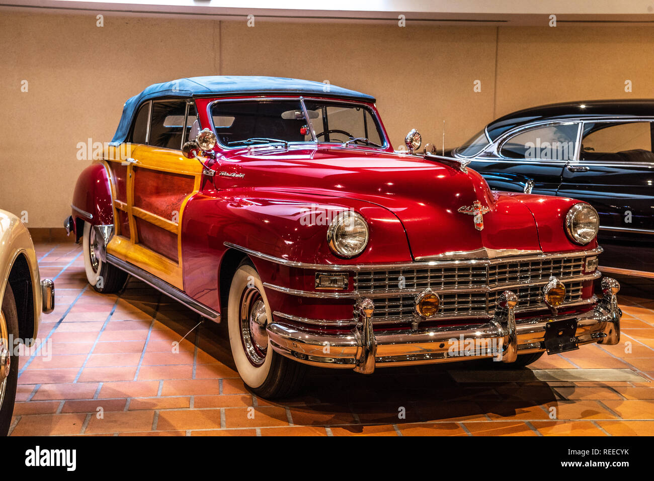 FONTVIEILLE, MONACO - JUN 2017: red CHRYSLER TOWN AND COUNTRY CONVERTIBLE 1947 in Monaco Top Cars Collection Museum. Stock Photo