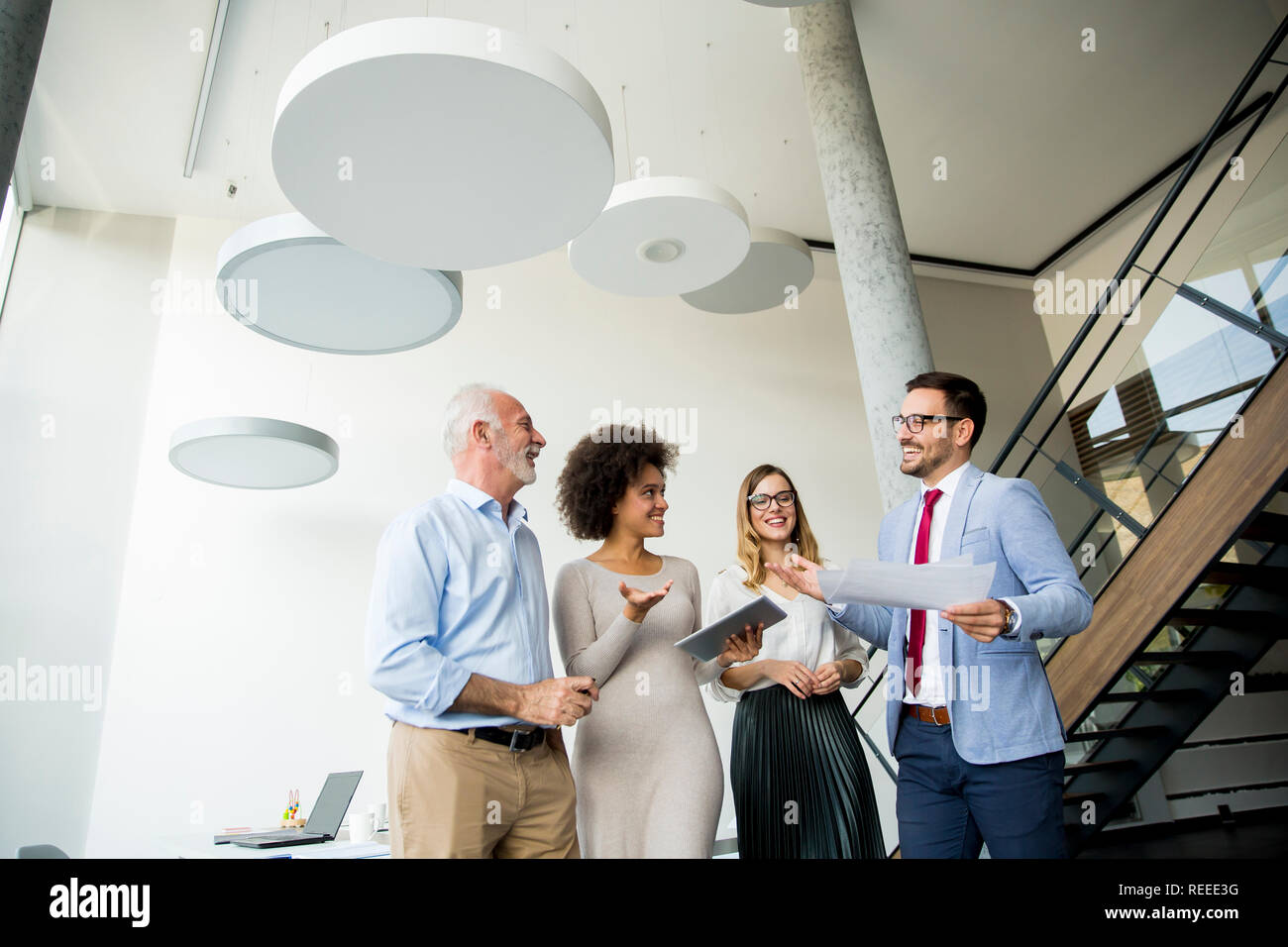 Group of successful business people standing in the modern office Stock ...