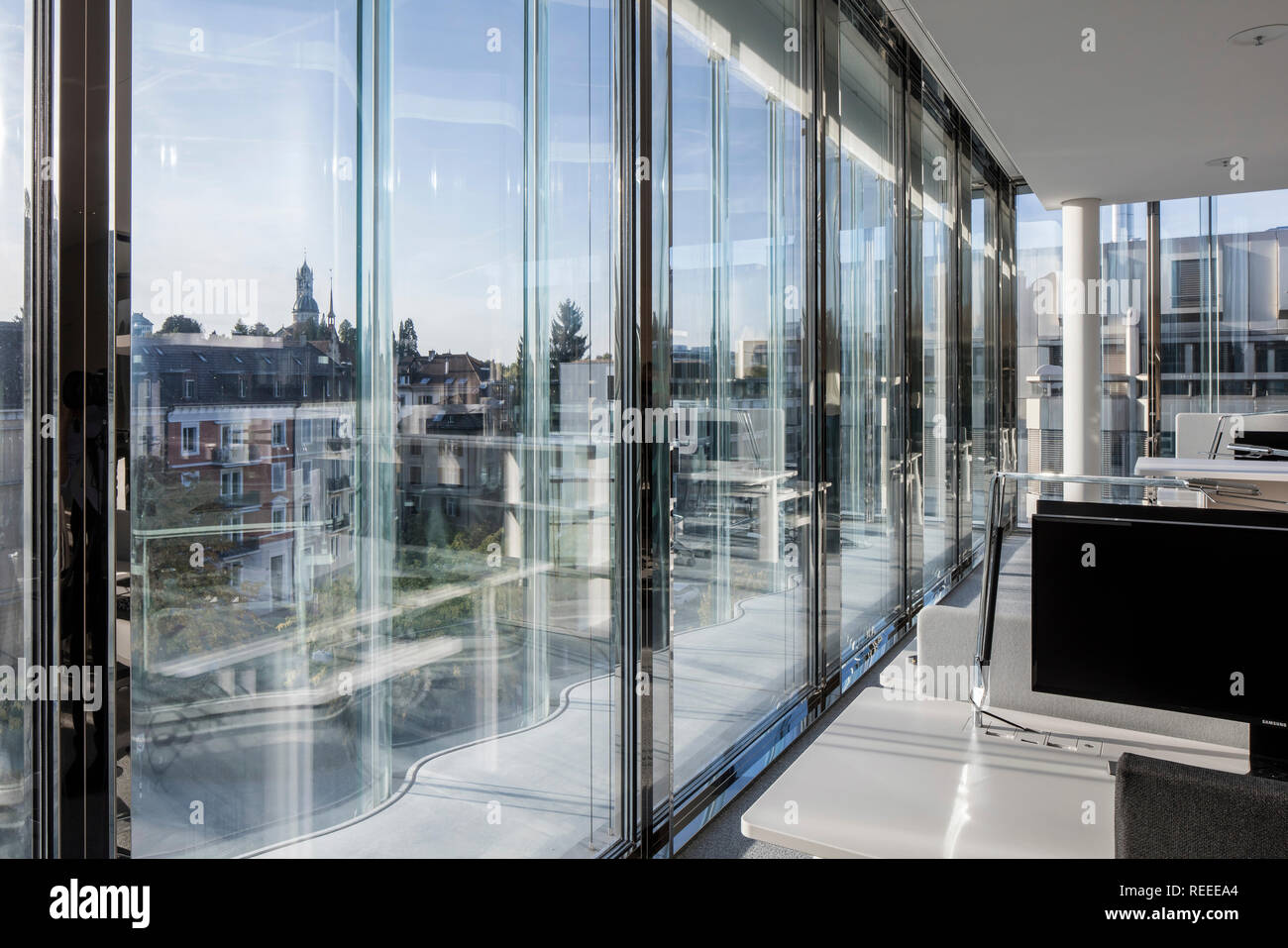 Window wall with view to city. Swiss Re Office headquarters, Zurich