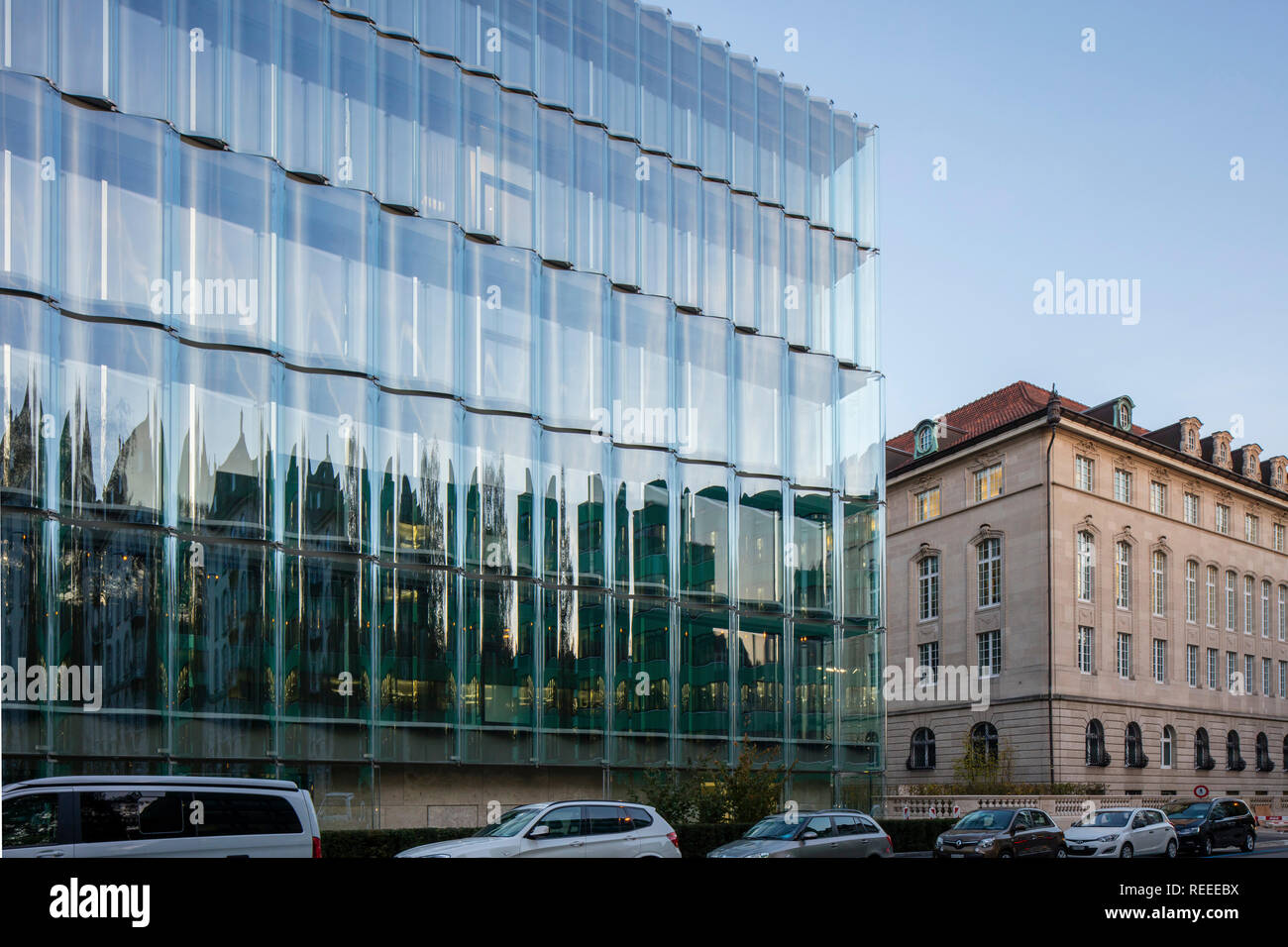 Facade juxtaposition. Swiss Re Office headquarters, Zurich, Switzerland
