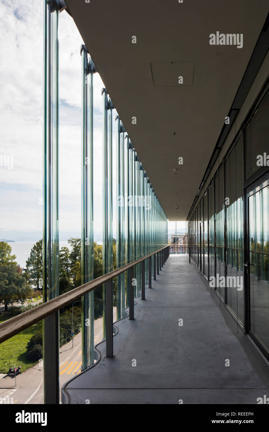 Corridor along window wall. Swiss Re Office headquarters, Zurich