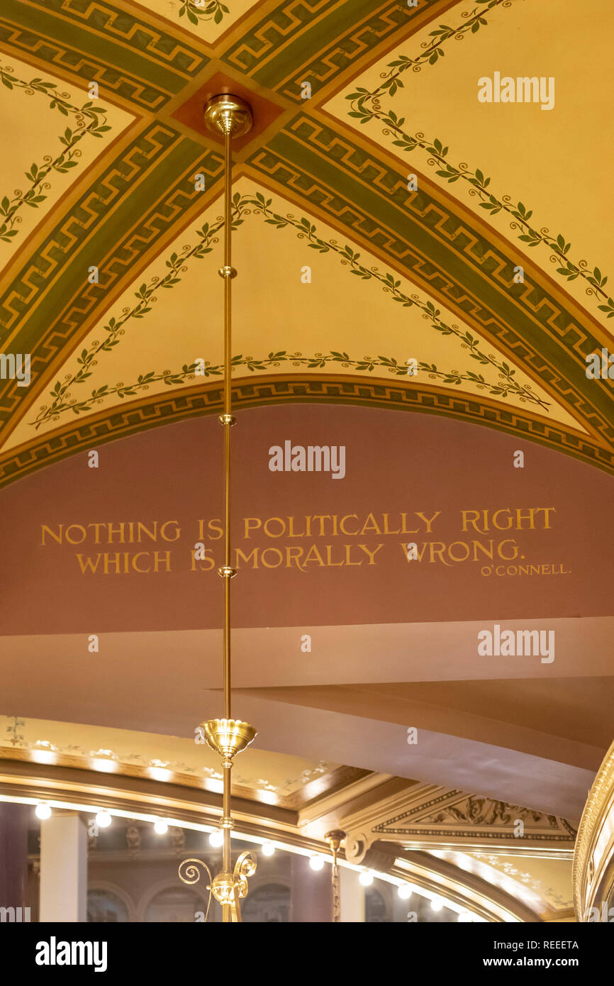 Des Moines, Iowa - The interior of the Iowa state capitol building. A quote from Daniel O'Connell is stenciled on the first floor: 'Nothing is politic Stock Photo