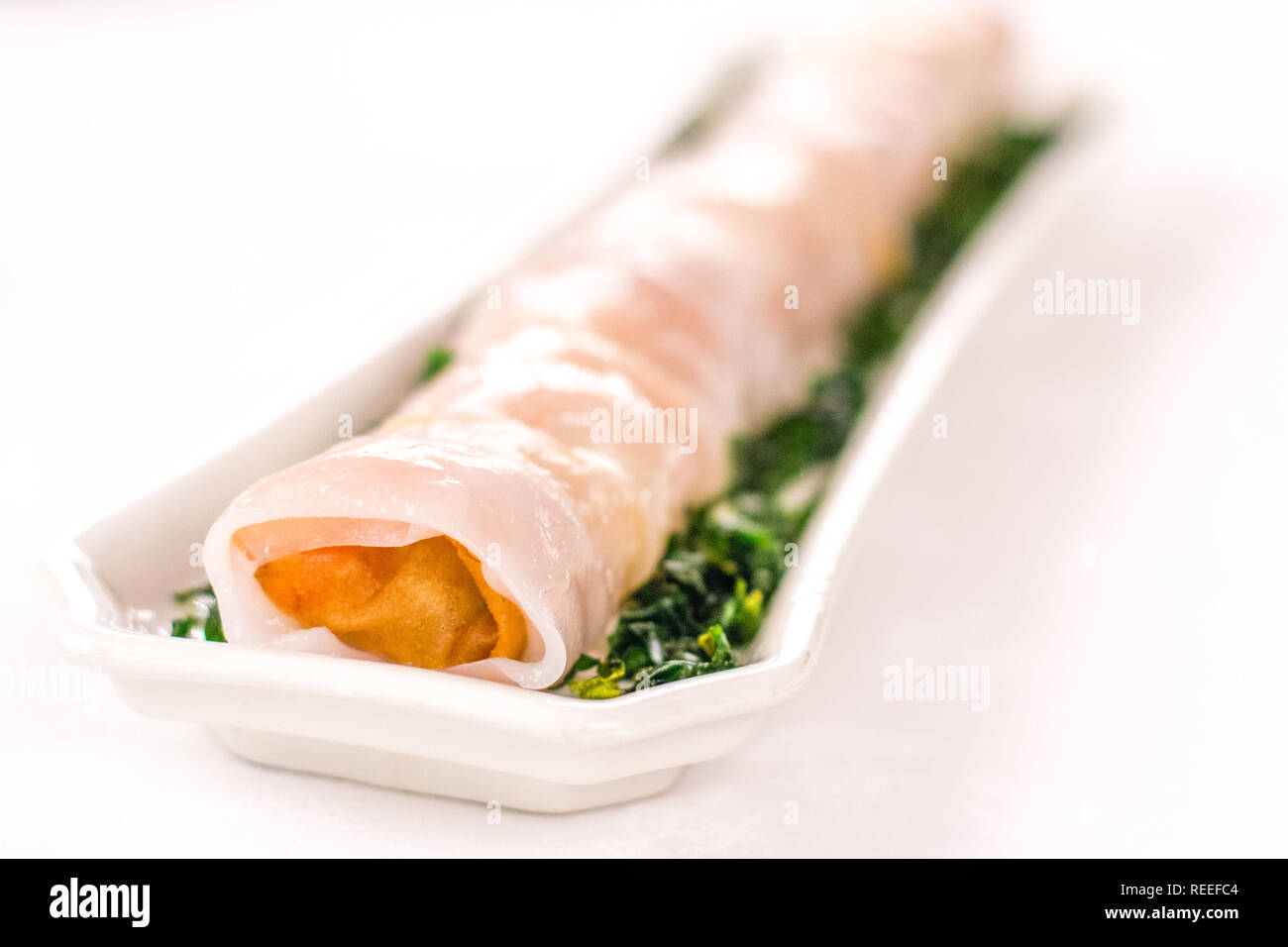 Steamed Rice Flour Roll with Deepfried Shrimp Spring Roll Stock Photo