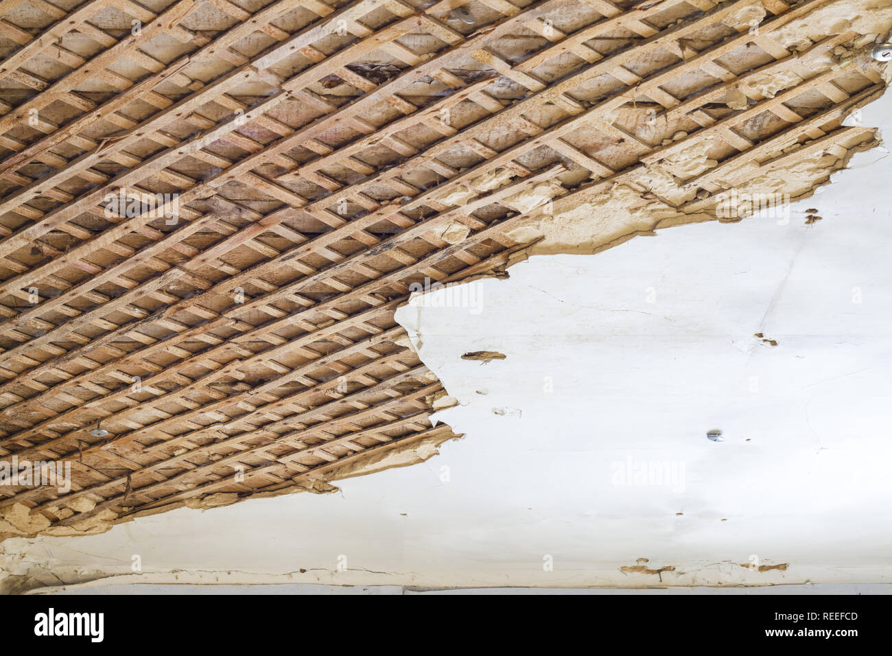 Ceiling before repair. Old wall destroyed decor background ...