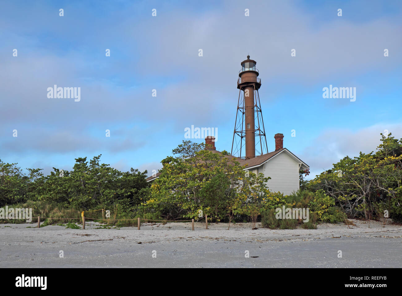 The Sanibel Island or Point Ybel Light on Sanibel Island, Florida with surrounding vegetation viewed from Lighthouse Beach Park Stock Photo