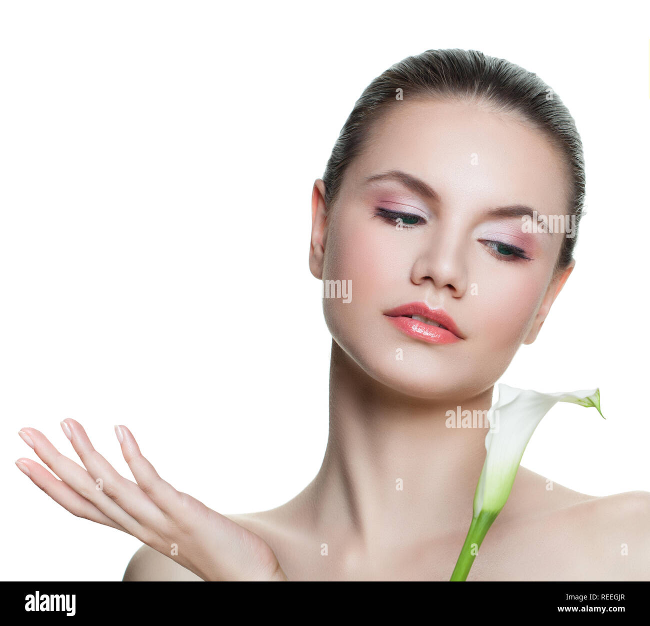 Spa woman thinking and showing empty copy space on the open hand ...