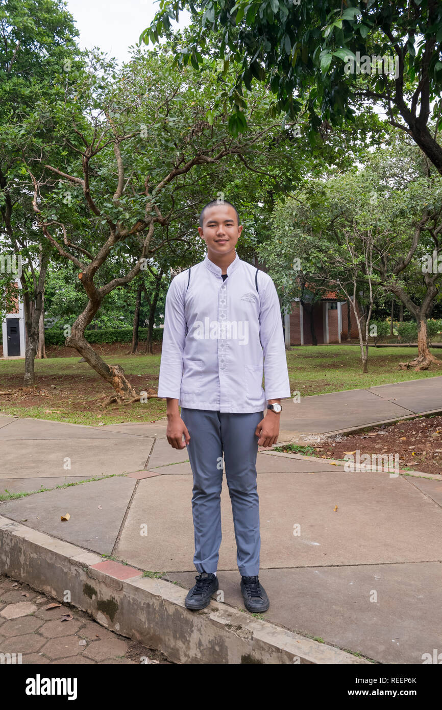 8.30, Dayak boy in uniform, IndonesianBook Stock Photo
