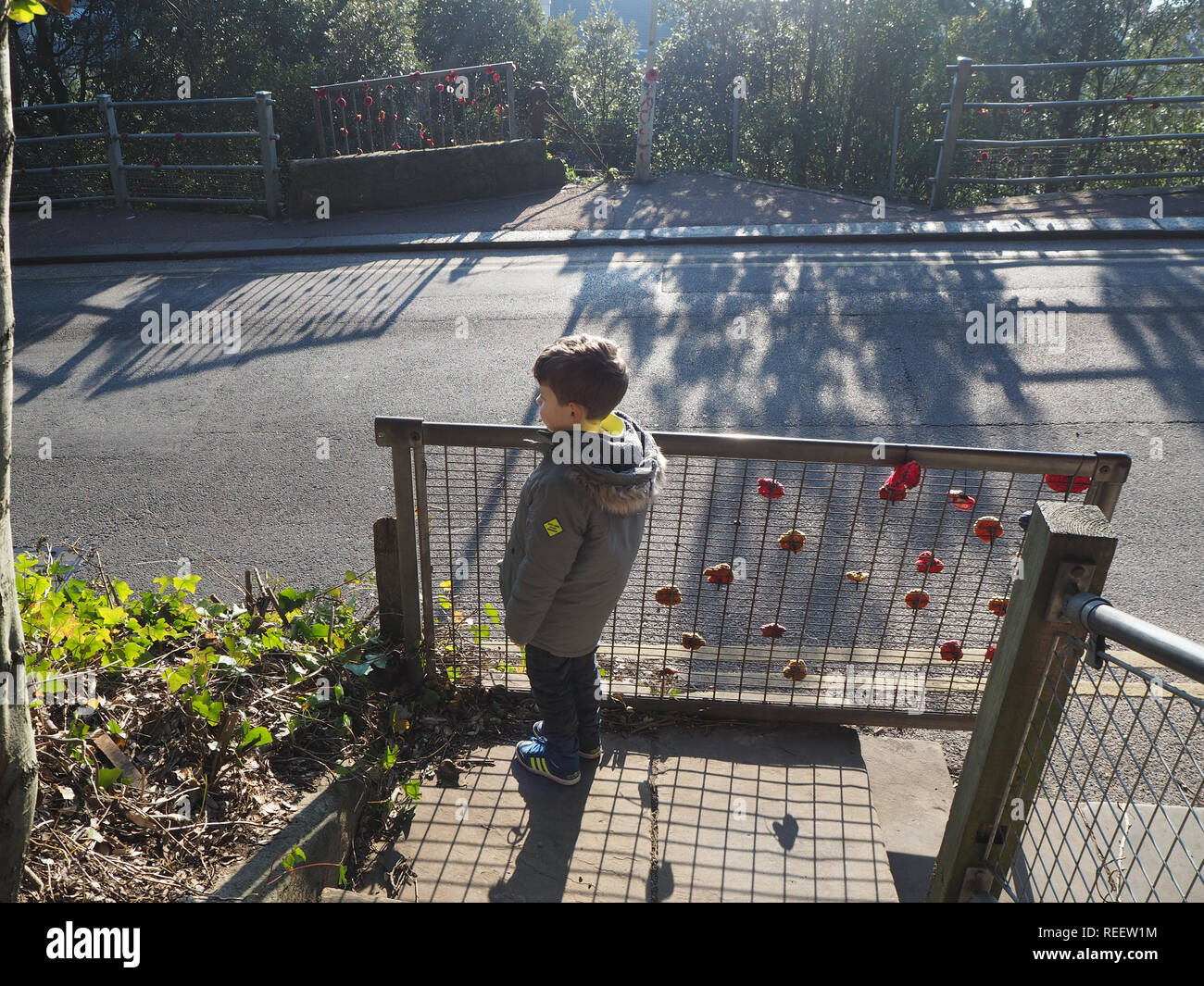 Young child playing on his own Stock Photo