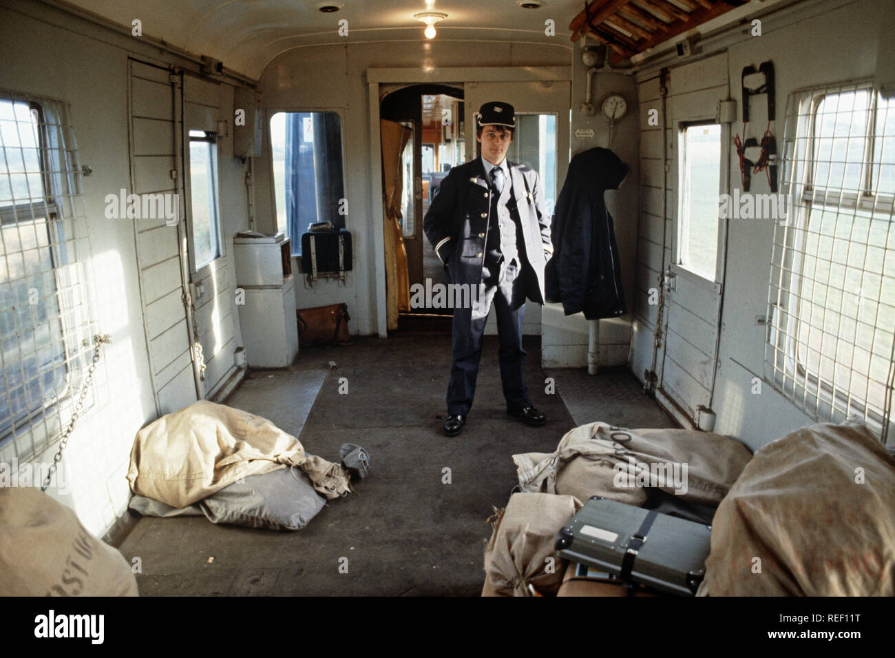 British Rail guard and ticket collector in the Diesel Multiple Unit