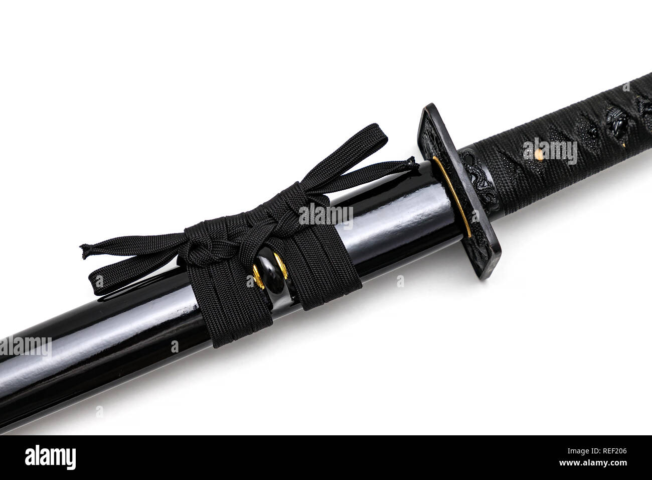 Close up Black Sageo : cord for tie the shiny black scabbard of Japanese sword isolated in white background Stock Photo