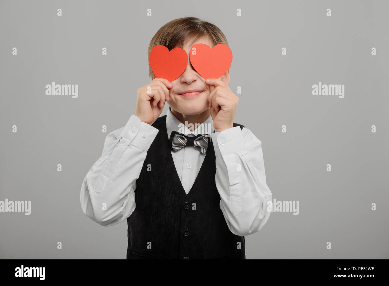 Young guy with heart eyes Stock Photo - Alamy